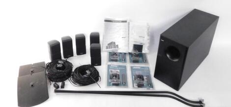 A Bose Acoustimass 10 Series II Home Theatre speaker system, with instructions, and four UB-20B wall ceiling brackets.