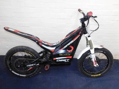 An Oset 20.0 Electric Trials Bike, 1200watt, max speed 15/20 mph, range 10 miles.