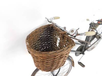 A vintage Raleigh Elswick lady's bicycle, green with wicker basket attachment to front. - 2