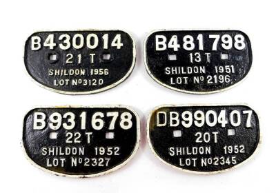 Four Shildon cast iron railway wagon plates, comprising DB990407 20T Shildon 1952 Lot No 2345, B93167822T Shildon 1952 Lot No 2327, B481798 13T Shildon 1951 Lot No 2195, and B430014 21T Shildon 1956 Lot No 3120.