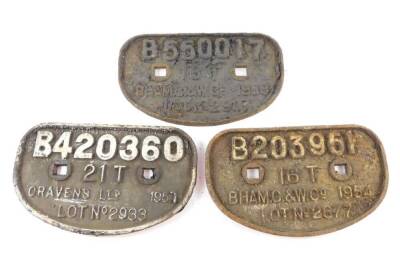 Three cast iron railway wagon plates, comprising B550017 16T B'ham. C. & .W.Co. 1958 Lot No 2907., B203951 16T B'ham .C.A.W. Co. 1954 Lot No 2677., and B420360 21T Craven's. Ltd. 1957 Lot No 2933.