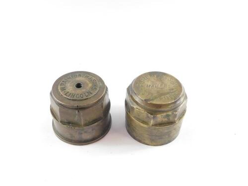 Two brass carriage wheel hub nuts, stamped Foreman & Son Makers Spalding, and W. Rainforth & Sons Lincoln respectively, both 9cm Dia.