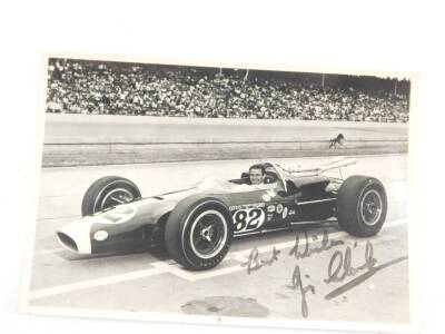 A signed photograph of Jim Clark at The Indianapolis 500 1965, photographed in his winning Lotus 38. - 2