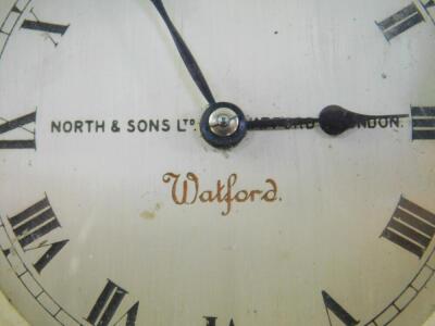 A Watford car clock by North & Sons Ltd of Watford, London, with silvered circular dial bearing Roman numerals, stamped to the reverse 2705. - 2