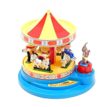 A Corgi Magic Roundabout musical carousel, No 852, with Swiss musical movement, boxed.