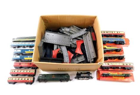 Tri-ang Railways 00 gauge R52 Jinty locomotive, BR black livery, a R.216 rocket launching wagon, boxed (lacking rocket), R.250 Double Ended Diesel (non-powered) boxed, further coaches, rolling stock, track and sundries, together with a Hornby 00 gauge R33