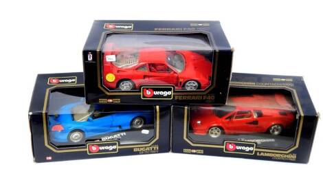 Three Burago die cast cars, scale 1:18, comprising Ferrari F40 (1987)., Lamborgini Countach (1988)., and Bugatti EB 110 (1991).