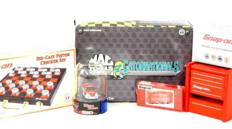 A Snap-On die cast piston chequer set, Snap-On 'The Tool Wall' holiday ornament, Snap-On playing cards, MacTools Gatornationals Funny Car, etc. (qty)