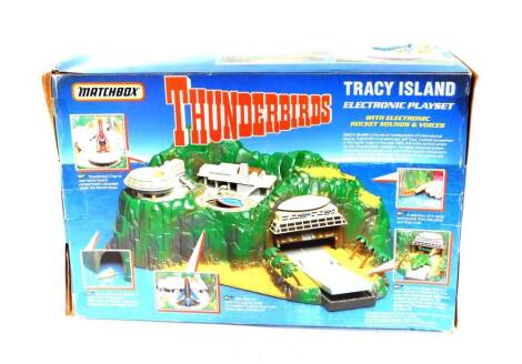 A Matchbox Thunderbirds Tracey Island electronic play set, with electronic rocket sounds and voices, boxed. (AF)