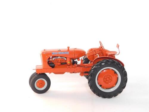 A Franklin Mint Precision Models Allis-Chalmers Tractor, 1:12 scale, orange.