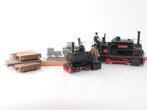 A kit built O gauge locomotive Dorothy, black livery, further O gauge locomotive, black livery, flat wagons, and a Bachmann Locomotion 1 model. (qty)