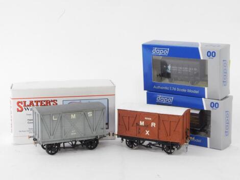 Two Slater's kit built O gauge wagons, including an M R 10 ton covered fruit van, boxed, together with two Dapol OO gauge wagons, boxed. (4)