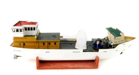 A Model Slipway kit built Vliestroom remote control buoy laying vessel, part constructed, with assembly instructions, 17cm H, 96cm L. (AF)