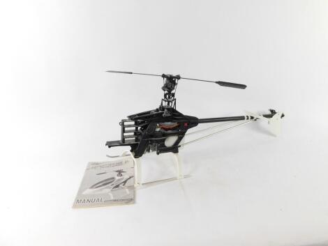 A kit built Thunder Tiger Raptor 30 Class Nitro RC helicopter, with manual, lacking plastic body and remote control. (AF)