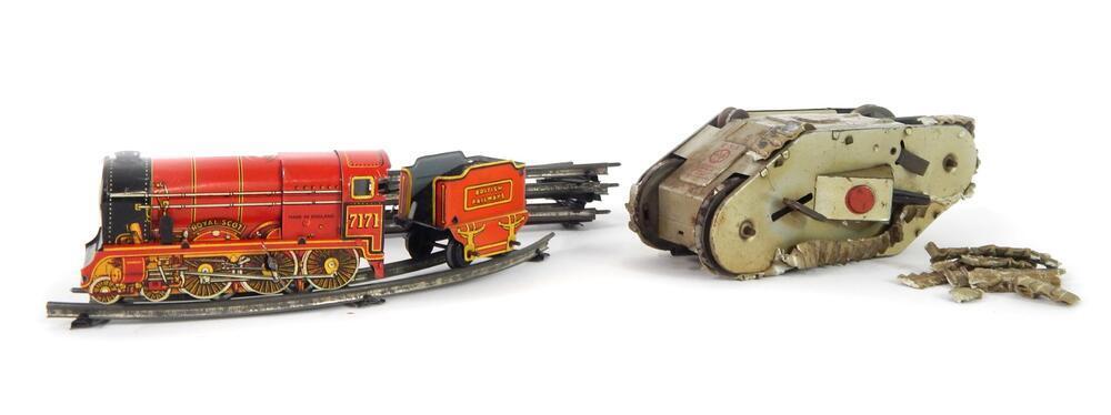 A British mid 20thC tin plate clockwork engine and tender, complete ...