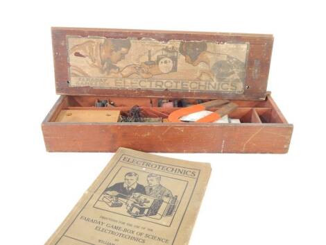 An Electrotechnics Faraday games box, with instructions, wooden box. (AF)