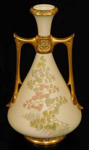 A Royal Worcester blush ivory two handled vase, decorated with tooled ferns, shape code 1021, puce marked, 25cm H.