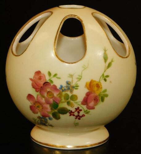 A Royal Worcester blush ivory pierced circular potpourri vase, decorated with flowers, shape code 991, 1906, 9cm H.