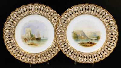A pair of Minton ribbon plates, decorated with fine landscapes, pattern no. A3082, c1860, 23m Dia. Ex Willis Collection.