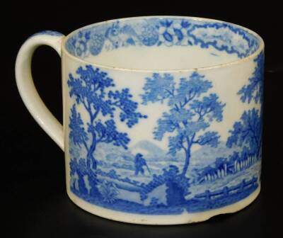 An early 19thC small pottery tankard, printed in blue and white with a thatched cottage pattern, c1825, 7.5cm H. (chip to foot rim) - 2