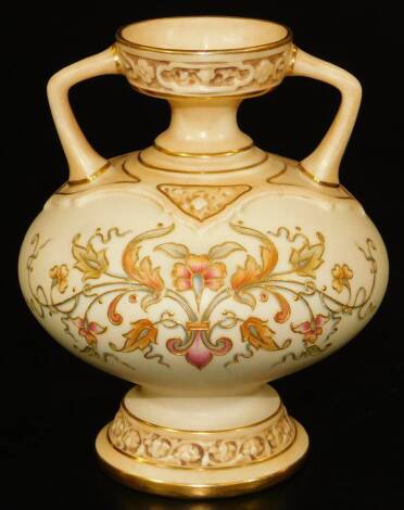 A Royal Worcester blush ivory ogee formed vase, with raised patera gilidng, shape code 1089, 1893, 11cm H.