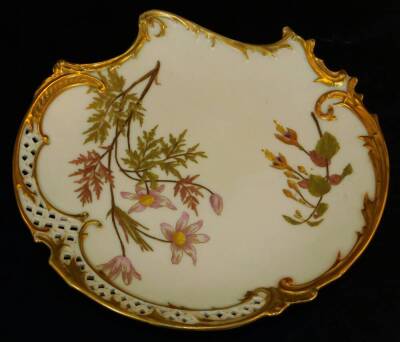 A Royal Worcester blush ivory low comport, decorated with flowers with a pierced rim, shape code 1426, 1891, 22cm Dia. - 2