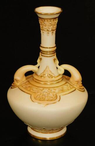 A late 19thC Royal Worcester porcelain blush ivory two handled vase, with cylindrical stem, bellied circular body, and circular foot, no. 1578, 19cm H.