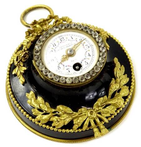 A Caisso & Co French small wall timepiece, the enamel dial decorated with floral swags and Roman numerals, signed by the manufacturer with address in Paris, the case applied with gilt metal swags, bows etc.