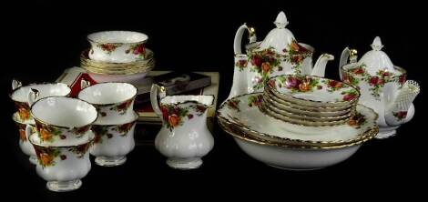 A Royal Albert Old Country Roses part tea service, to include a 20cm teapot, another smaller, cups, saucers, serving plates, cased cake slice, printed marks beneath, etc. (a quantity)
