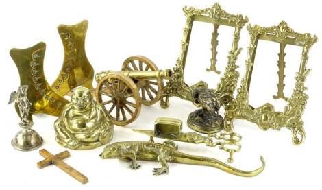 Various brass ware ornaments, to include a lizard, 22cm W, metal quail, photograph frames, boots, canon, etc. (a quantity)