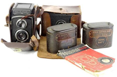 Various cameras, comprising a Rolleicord DRP, in leather case, another similar, with guide, Lincoln Savings bank and another. (a quantity)