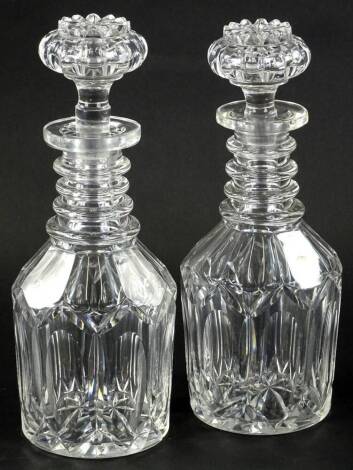 A pair of 19thC triple ring necked decanters and stoppers, 29cm H.