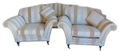 A Stead three piece suite, with stripe fabric on turned legs.