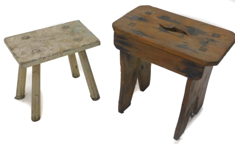 A 19thC Country made cream painted four legged stool, 35cm W, and a pine stool with pierced handle and fish tail ends.