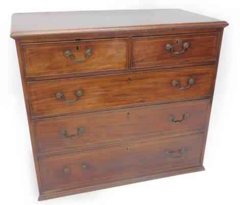 An early 19thC mahogany and boxwood strung chest of drawers, the top with a moulded edge above two short and three long drawers, lacking feet, (AF), 105cm W.