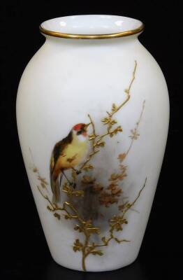 A late 19thC Grainger & Co Worcester blush ivory slim vase, decorated with a chaffinch in branches, shape code G461, 11cm H.