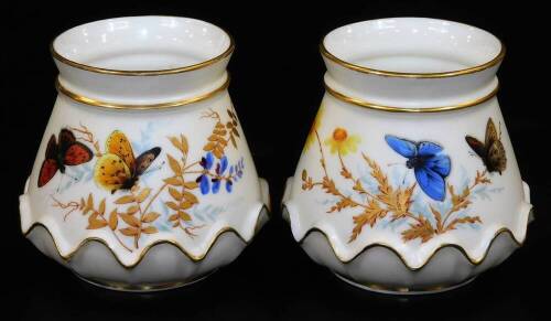 A pair of Royal Worcester blush ivory small squat vases, shape code 991, decorated with butterflies, green marked, 1895, 8cm H.