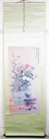 A Chinese scroll, depicting a jardiniere of flowers, signed an sealed to the upper right, 56cm W.