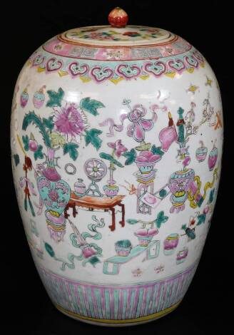 A Chinese porcelain ovoid jar and cover, decorated in famille rose palette with precious objects in a famille rose palette between ruyi and lappet borders, 33cm H.