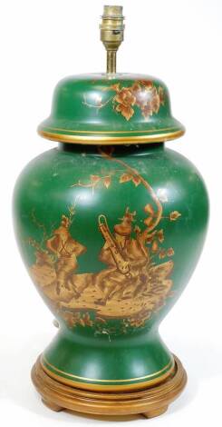 An oriental design lamp vase, in green with gilt highlights, decorated with figures, flowers and leaf heads on a circular base with light fitting, 56cm H.