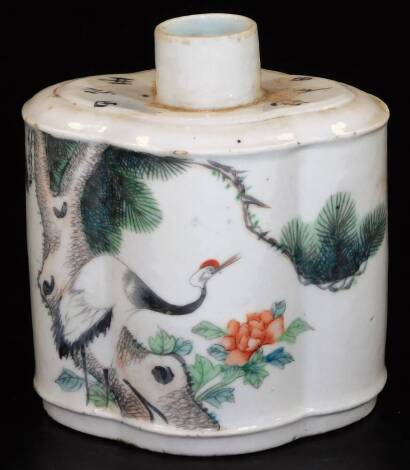 A Chinese porcelain tea caddy, of lobed oval form, decorated with scenes, exotic birds, buildings and hills, in green and black, characters on the shoulder, impressed mark beneath, 16cm H.