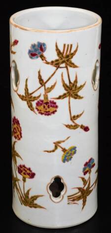 A 20thC Chinese porcelain spill vase, of cylindrical form pierced with shaped cutouts, decorated with flowers in green, yellow and blue, four character mark in red to the base, 29cm H.