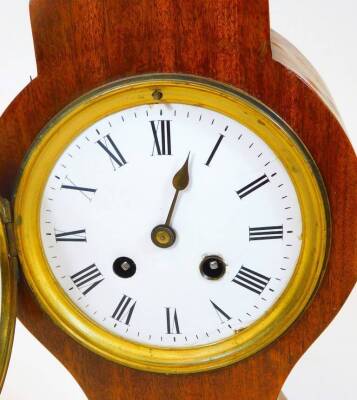 A 19thC mahogany balloon clock, the shaped case on an inverted stem and platform base, terminating in brass hairy paw feet and flanked by shaped handles with a 12cm Dia. enamel dial with Roman numerals revealing an 8-day movement, 39cm H, with key. - 2