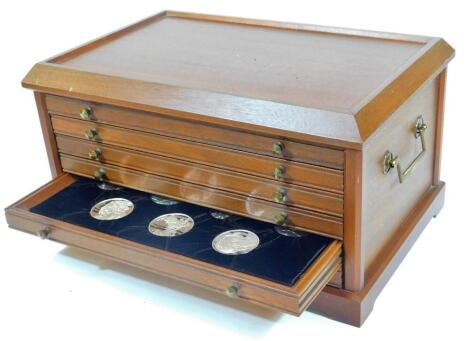 A silver Genius of Leonardo Da Vinci cased medallion set, comprising fifty medallions with paperwork, each 1.6oz, in fitted case, 44cm W.