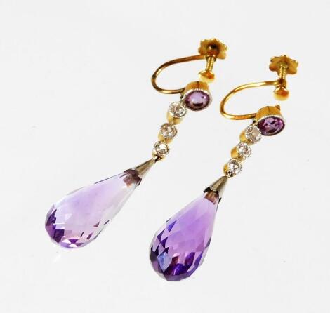 A pair of 18ct gold amethyst and diamond drop earrings, with tear drop shaped amethyst drop and row of three tiny diamonds and single amethyst in white metal setting, on screw backs, marked 18ct, the drop 3.5cm high, 4.4g all in.