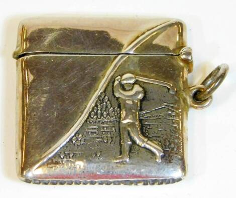 An early 20thC vesta case, raised with golfer with side ring handle and match strike base, marked Sterling, 3cm H.