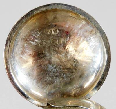 A George V silver spring loaded sovereign case, of circular form, partially engine turned, with fitted interior and hook top, Birmingham 1915, 4cm H. - 3