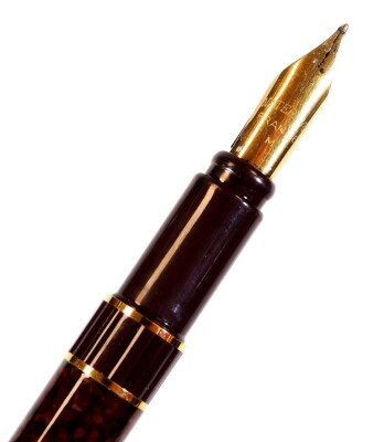 A Waterman Expert fountain pen, in textured brown and gilt colours, with pierced gilt clip, banding with nip stamped M, 14cm W. - 2