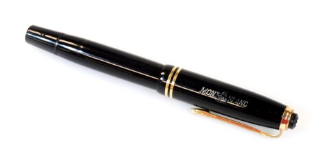 A Montblanc 244 fountain pen, in black with gilt clip and banding, No.4 nib. 12cm W.