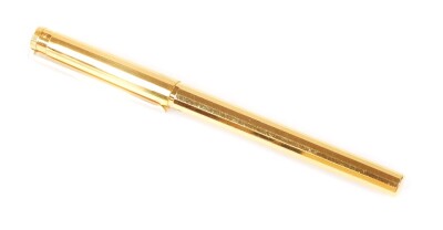 A St Dupont fountain pen, initialled LBS 1992 to the clip, gilt colours with nib marked 750, 14cm W.